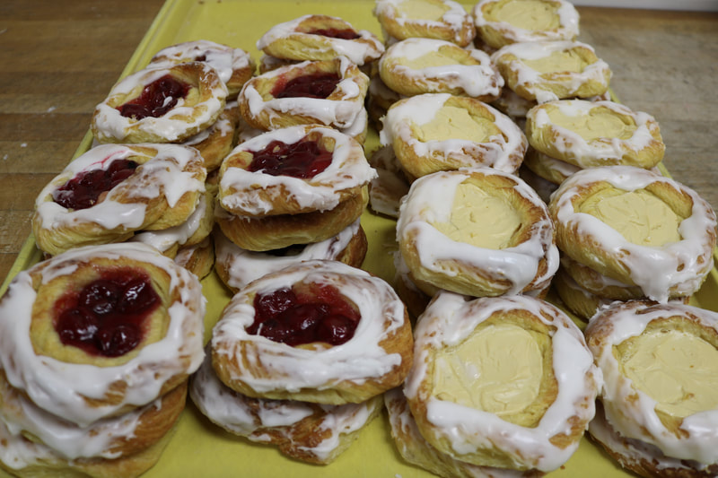 Photo of Cherry and Custard Danish on bakery tray.